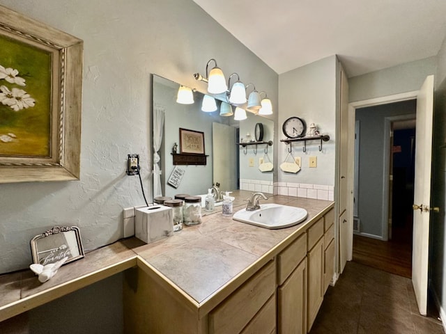 bathroom featuring vanity and tile patterned flooring