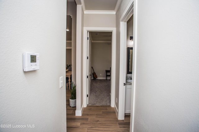 1308 Dover Ln, Wolfforth, TX 79382 - corridor featuring crown molding, wood finished floors, and baseboards