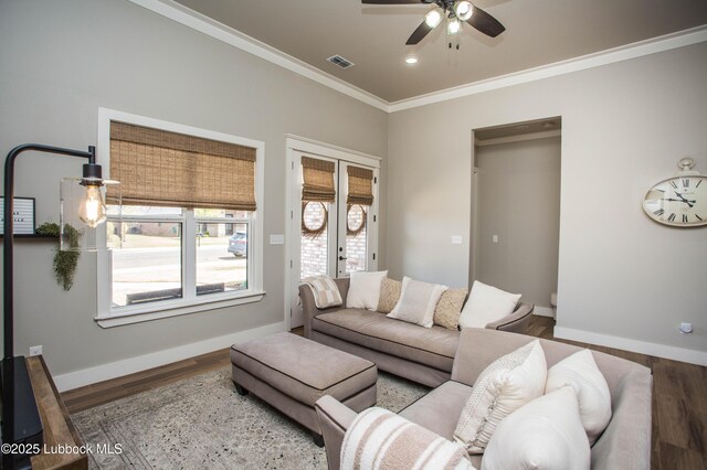 1308 Dover Ln, Wolfforth, TX 79382 - living room featuring ceiling fan, wood finished floors, baseboards, crown molding, and recessed lighting