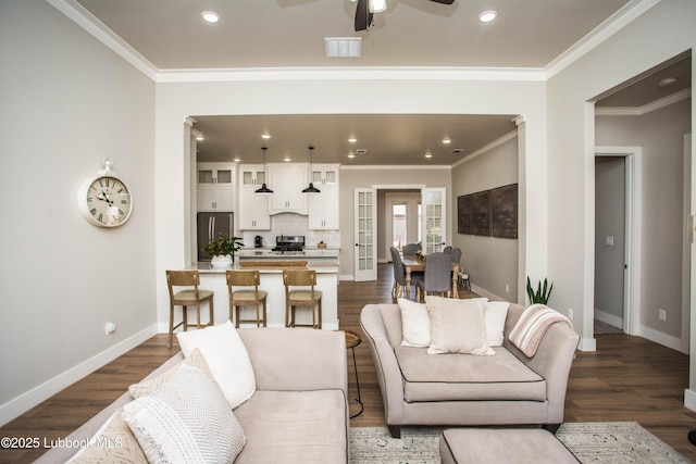 1308 Dover Ln, Wolfforth, TX 79382 - living room with ceiling fan, dark wood-style floors, baseboards, recessed lighting, and ornamental molding