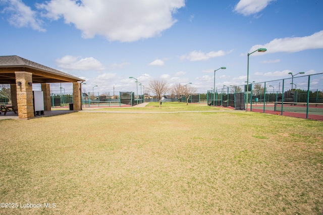 1308 Dover Ln, Wolfforth, TX 79382 - view of home's community with a tennis court