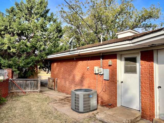 view of property exterior featuring central AC