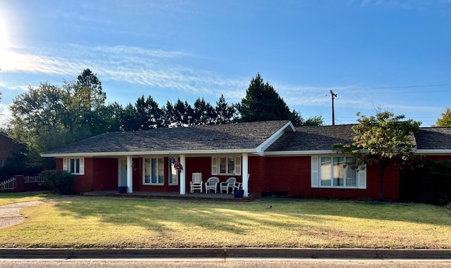 single story home with a front yard