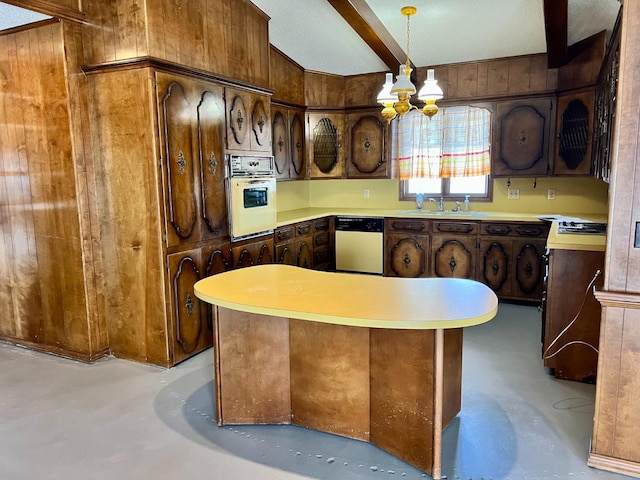 kitchen with hanging light fixtures, wall oven, a notable chandelier, stainless steel dishwasher, and wood walls