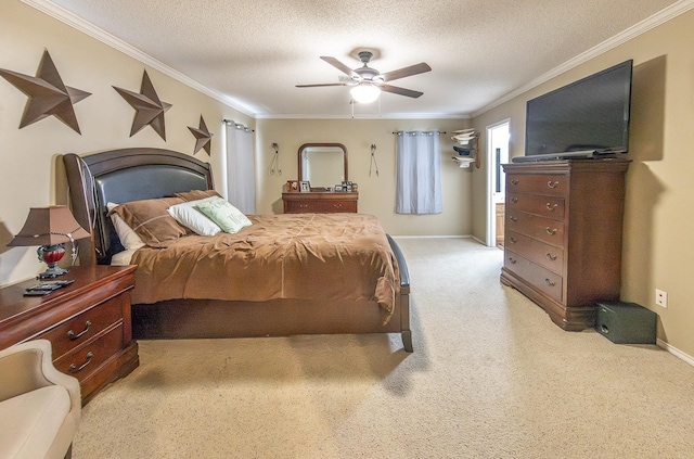 carpeted bedroom with crown molding, ceiling fan, and a textured ceiling