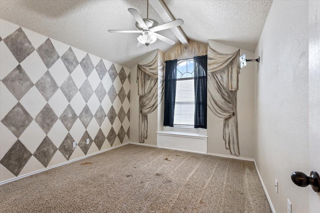 carpeted spare room featuring vaulted ceiling with beams, a textured ceiling, and ceiling fan