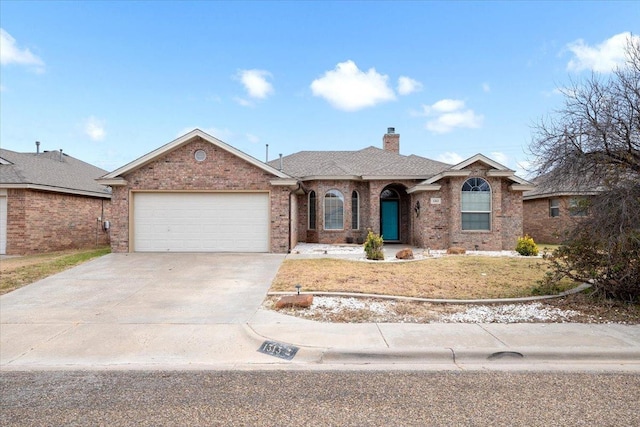 ranch-style house featuring a garage