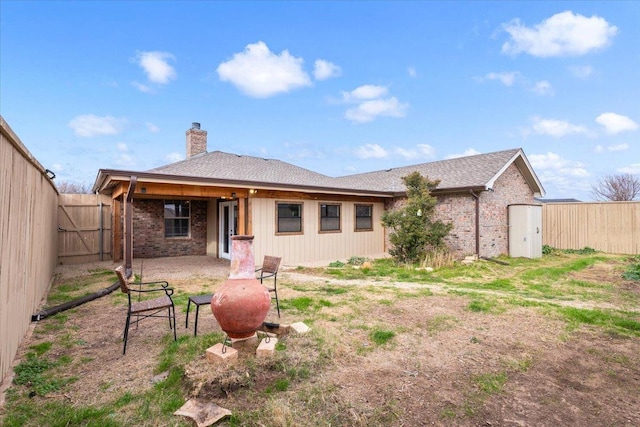 back of house featuring a patio area