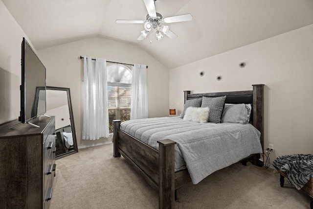 bedroom featuring lofted ceiling, light carpet, and ceiling fan