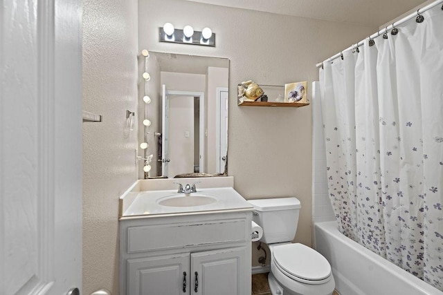 full bathroom featuring vanity, shower / bathtub combination with curtain, and toilet