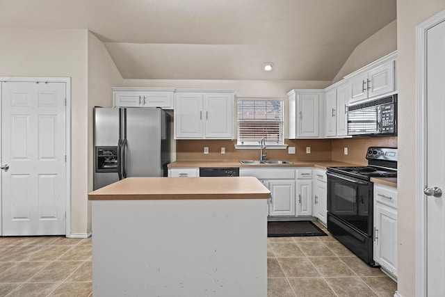 kitchen with sink, white cabinetry, a center island, vaulted ceiling, and black appliances