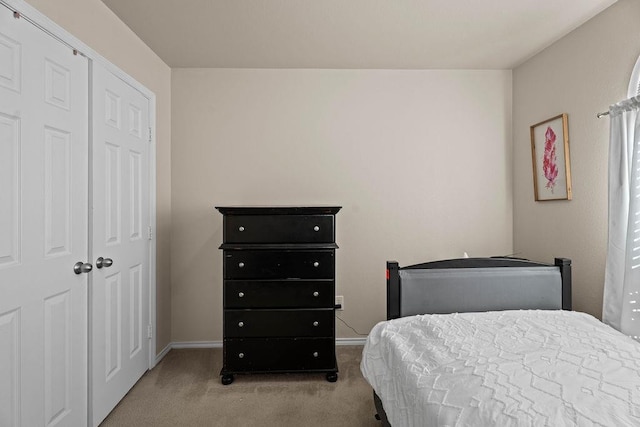 bedroom with light carpet