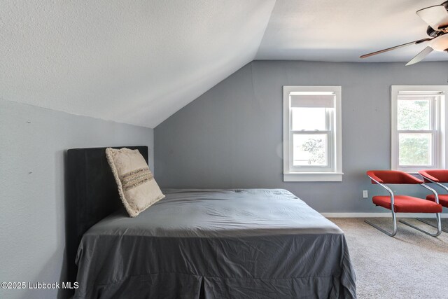 5320 25th St, Lubbock, TX 79407 - carpeted bedroom featuring lofted ceiling and ceiling fan