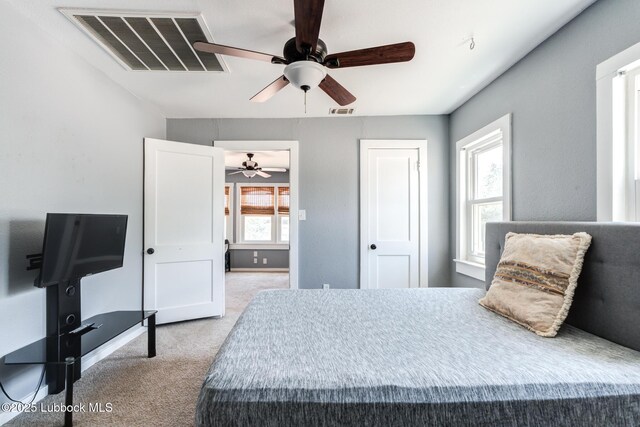 5320 25th St, Lubbock, TX 79407 - carpeted bedroom featuring ceiling fan and baseboards