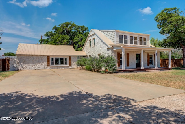 5320 25th St, Lubbock, TX 79407 - view of front facade with stone siding and covered porch