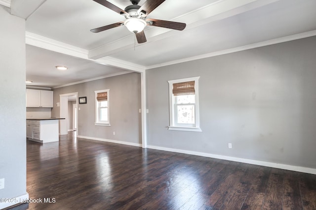 5320 25th St, Lubbock, TX 79407 - unfurnished living room featuring a ceiling fan, crown molding, dark wood-type flooring, baseboards, and beam ceiling