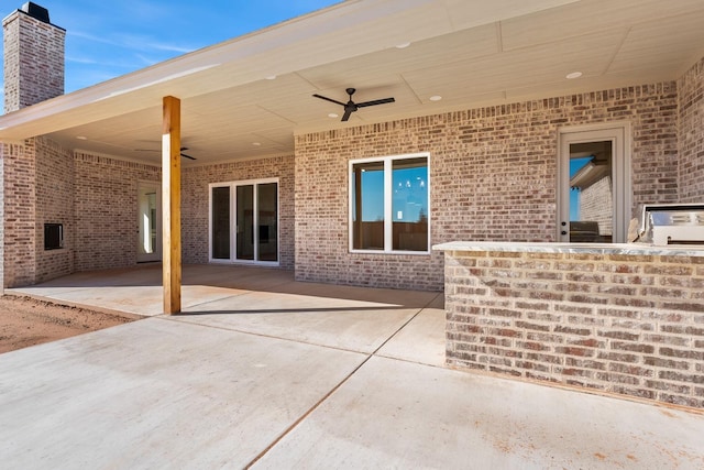 view of patio with ceiling fan