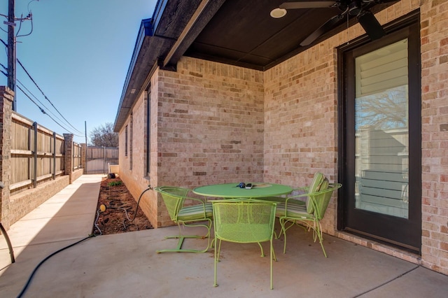 view of patio / terrace featuring ceiling fan