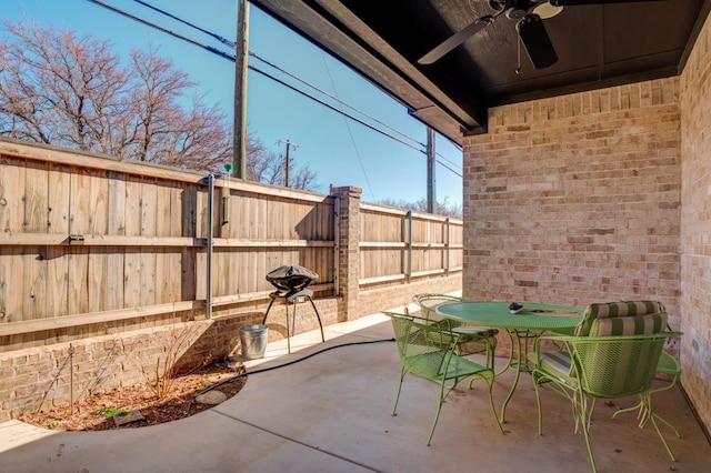 view of patio / terrace featuring ceiling fan