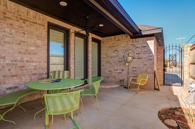 view of patio / terrace featuring ceiling fan