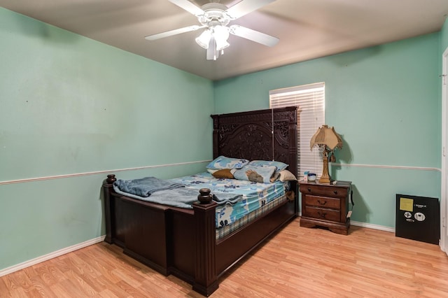 bedroom featuring ceiling fan and light hardwood / wood-style flooring