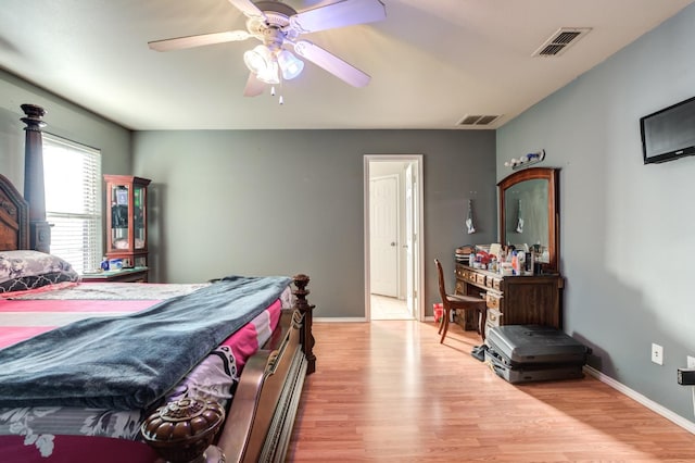 bedroom featuring ceiling fan and light hardwood / wood-style floors