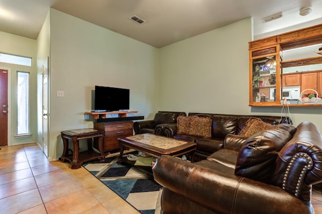 living room featuring light tile patterned floors