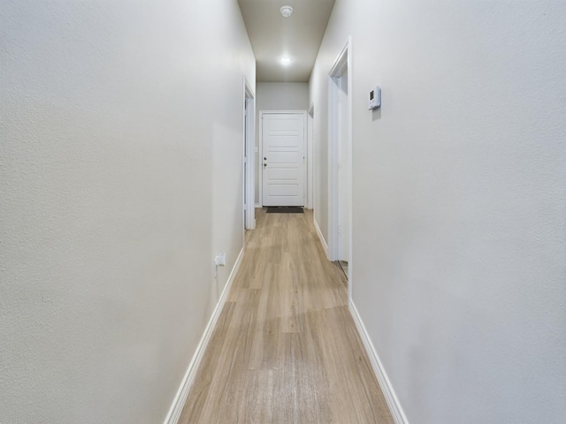 hallway featuring light wood-type flooring