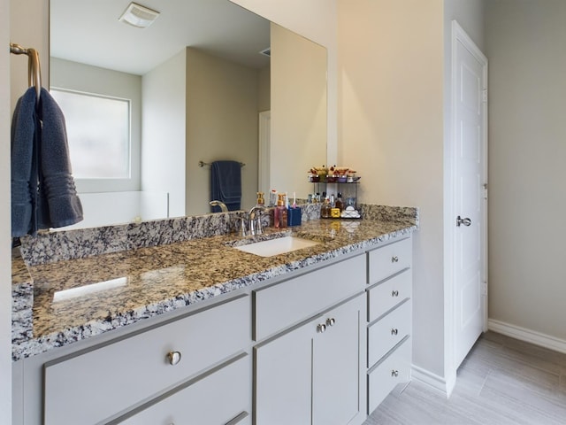 bathroom featuring vanity