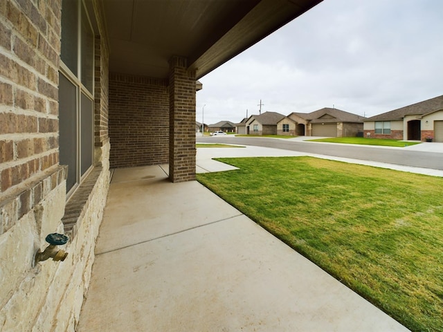 view of yard featuring a garage