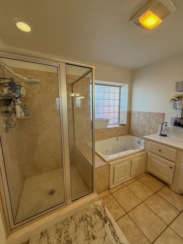 bathroom with shower with separate bathtub and tile patterned floors