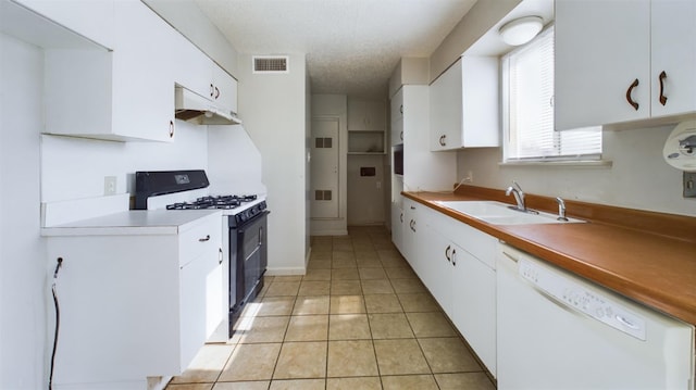 kitchen featuring white cabinetry, dishwasher, and black gas stove