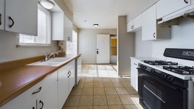 kitchen with white cabinetry, range hood, sink, and range with gas cooktop