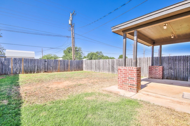 6205 21st St, Lubbock, TX 79407 - fenced backyard with a patio