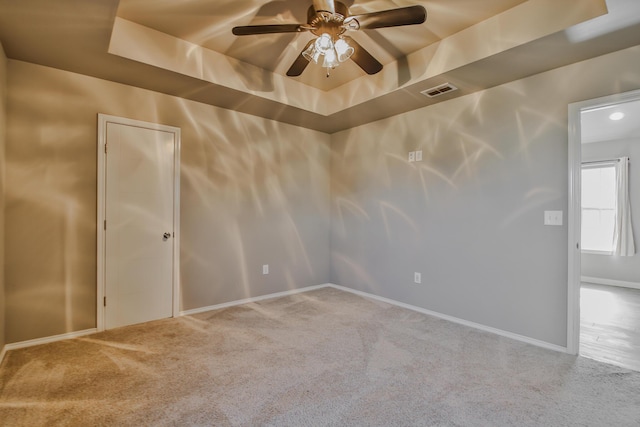 6205 21st St, Lubbock, TX 79407 - carpeted spare room with ceiling fan and a raised ceiling