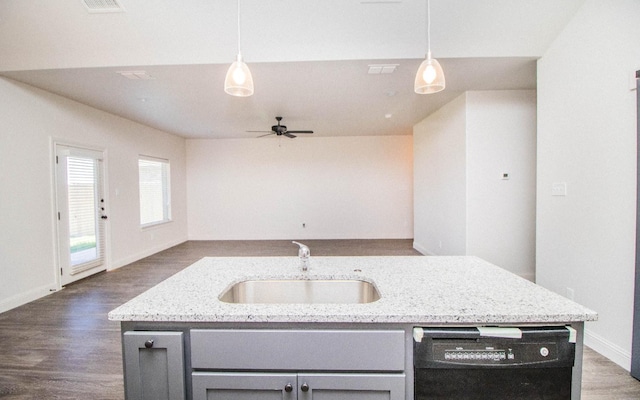 kitchen with pendant lighting, sink, gray cabinets, and black dishwasher