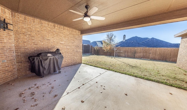 view of patio featuring grilling area and ceiling fan