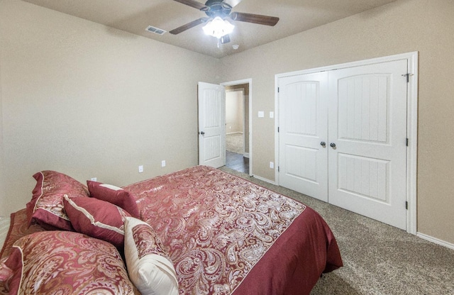 bedroom featuring carpet flooring, ceiling fan, and a closet