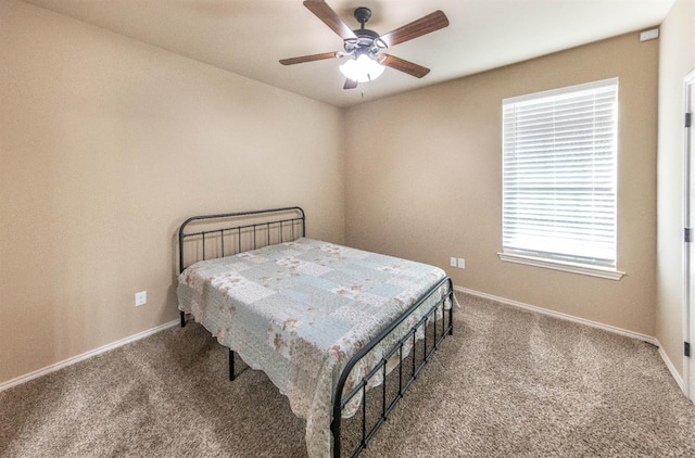 bedroom featuring ceiling fan and carpet flooring