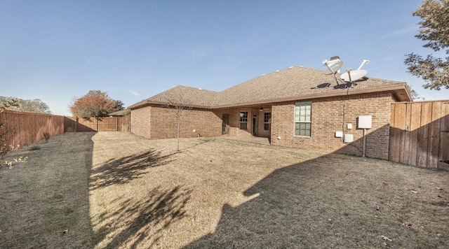 rear view of property with a patio area