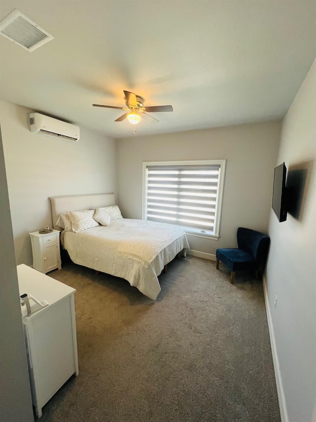 carpeted bedroom with ceiling fan and a wall mounted air conditioner