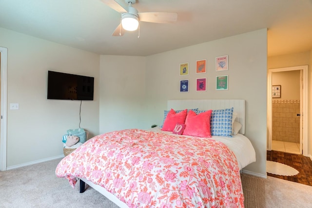 bedroom featuring carpet flooring, connected bathroom, and ceiling fan