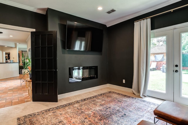 unfurnished living room with crown molding and french doors