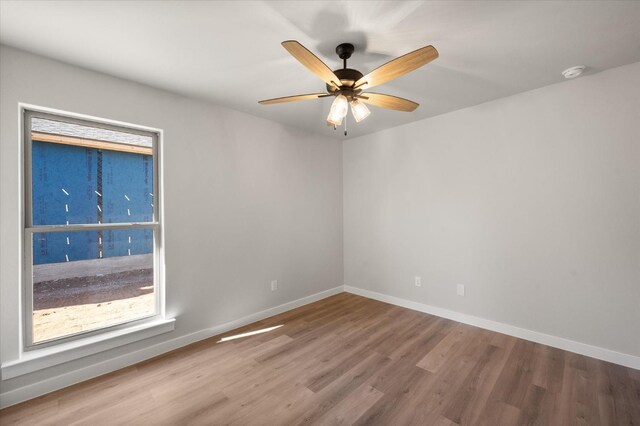 6811 54th St, Lubbock, TX 79407 - unfurnished room featuring hardwood / wood-style flooring and ceiling fan