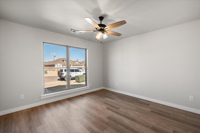 6811 54th St, Lubbock, TX 79407 - unfurnished room featuring dark hardwood / wood-style floors and ceiling fan