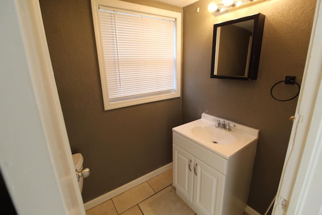 bathroom featuring vanity and tile patterned flooring