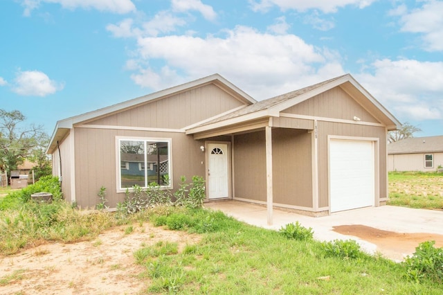 single story home featuring a garage