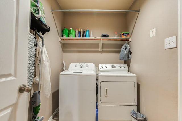 washroom with washer and dryer