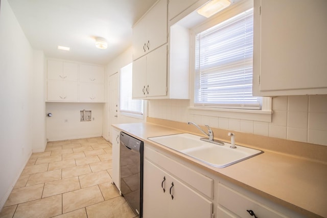 kitchen with white cabinetry, sink, backsplash, and black dishwasher