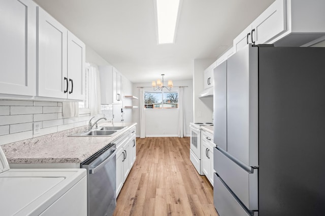 kitchen with stainless steel appliances, white cabinetry, sink, and pendant lighting